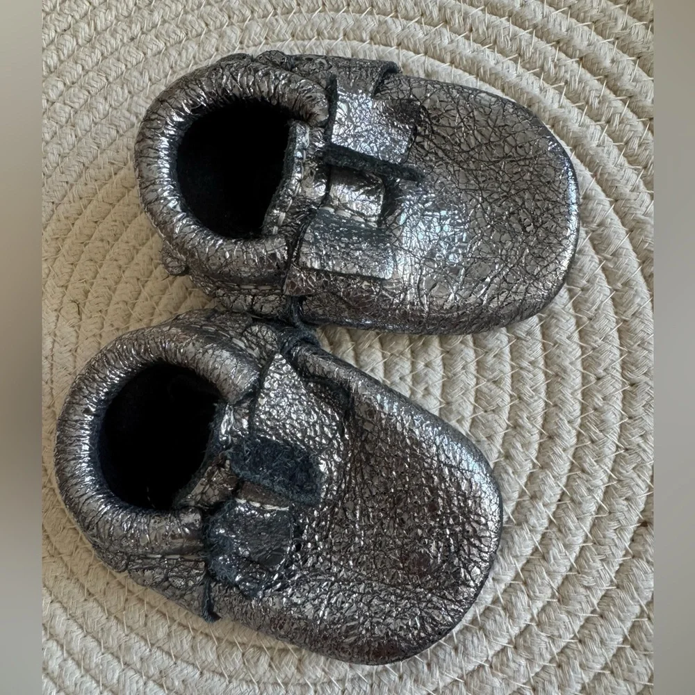 Freshly picked metallic silver mocs newborn